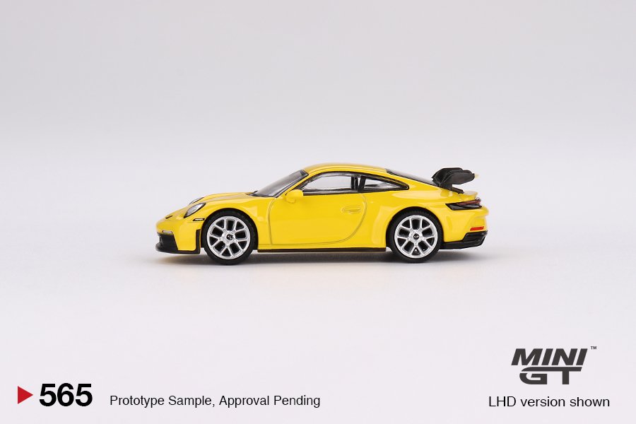 MINI GT #565 — Porsche 911 (992) GT3 Racing Yellow LHD / RHD version available - Image 5