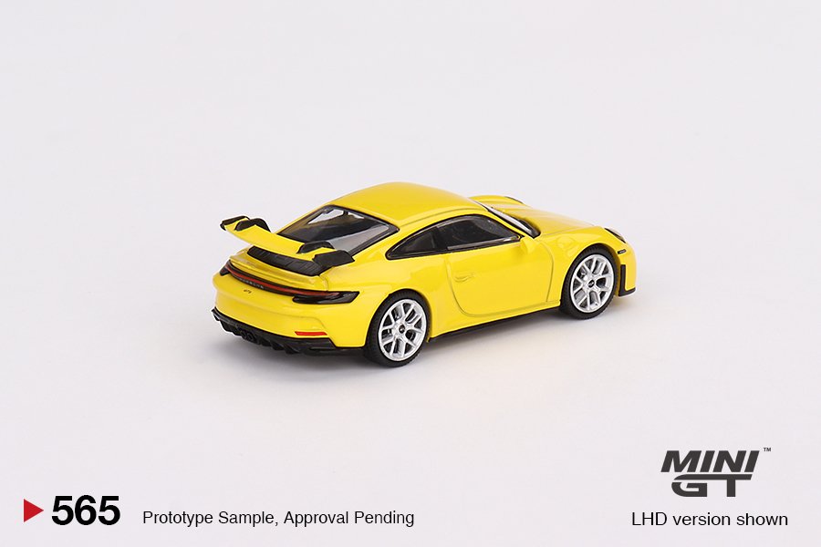 MINI GT #565 — Porsche 911 (992) GT3 Racing Yellow LHD / RHD version available - Image 4